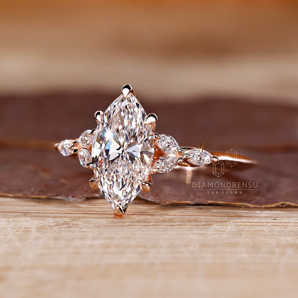 1 - 2 CT Marquise Shaped Diamond Ring with Marquise Side Stone