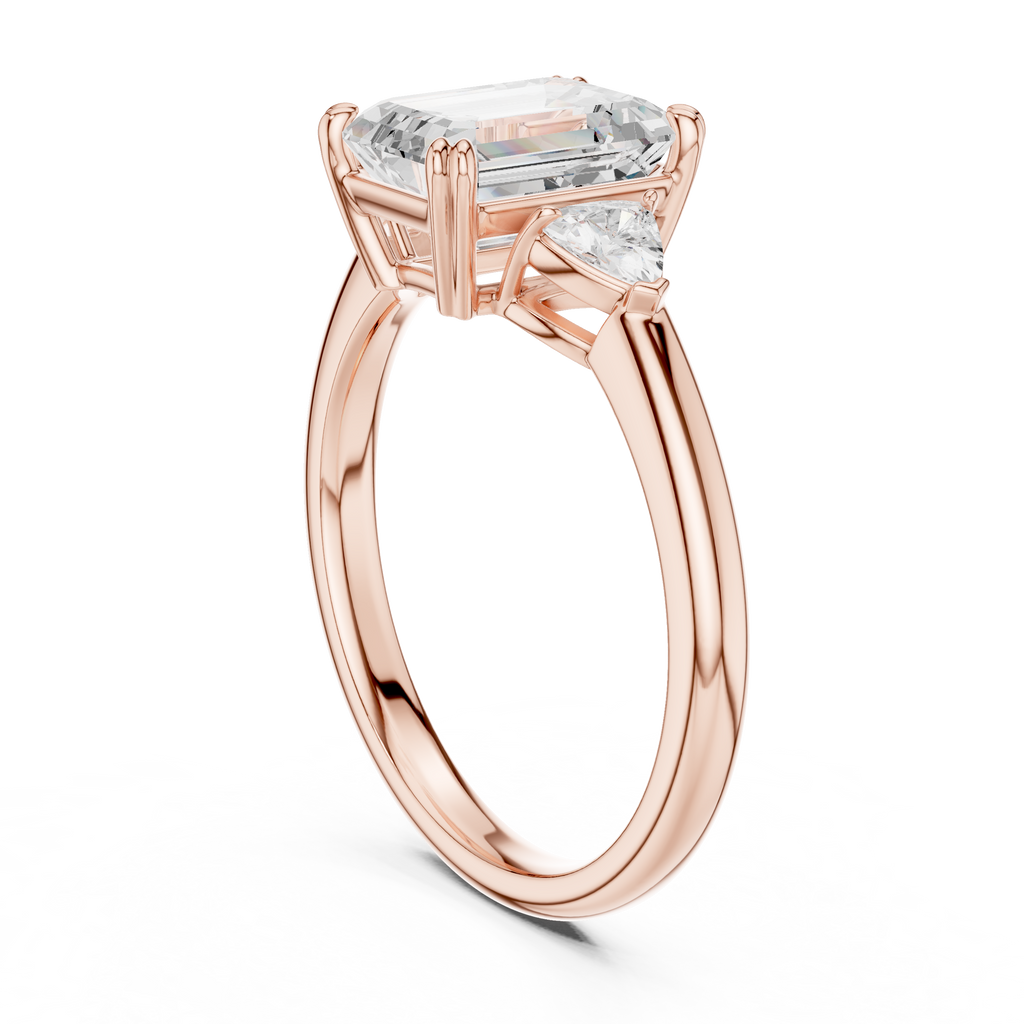 Emerald Cut Three Stone Diamond Engagement Ring with Trillion Side Stones