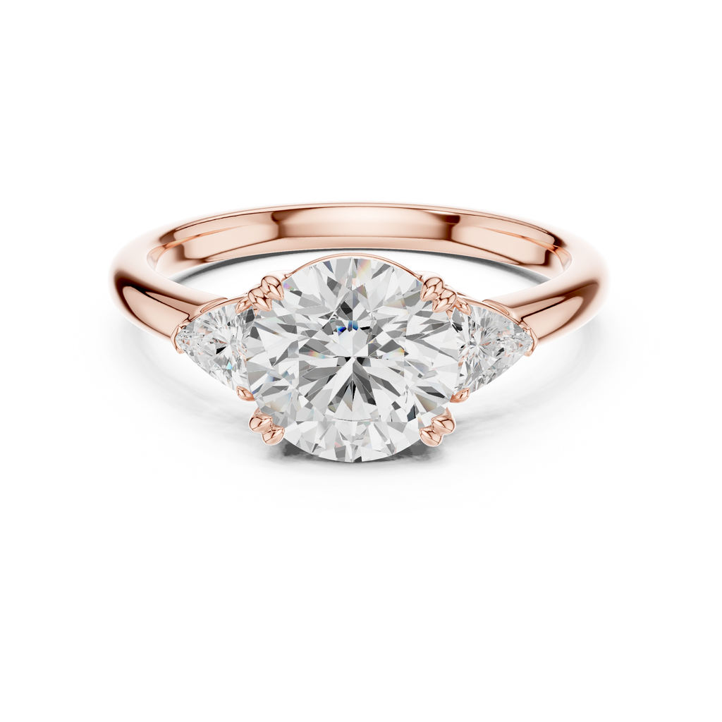 Round Cut Three Stone Diamond Engagement Ring with Trillion Side Stones