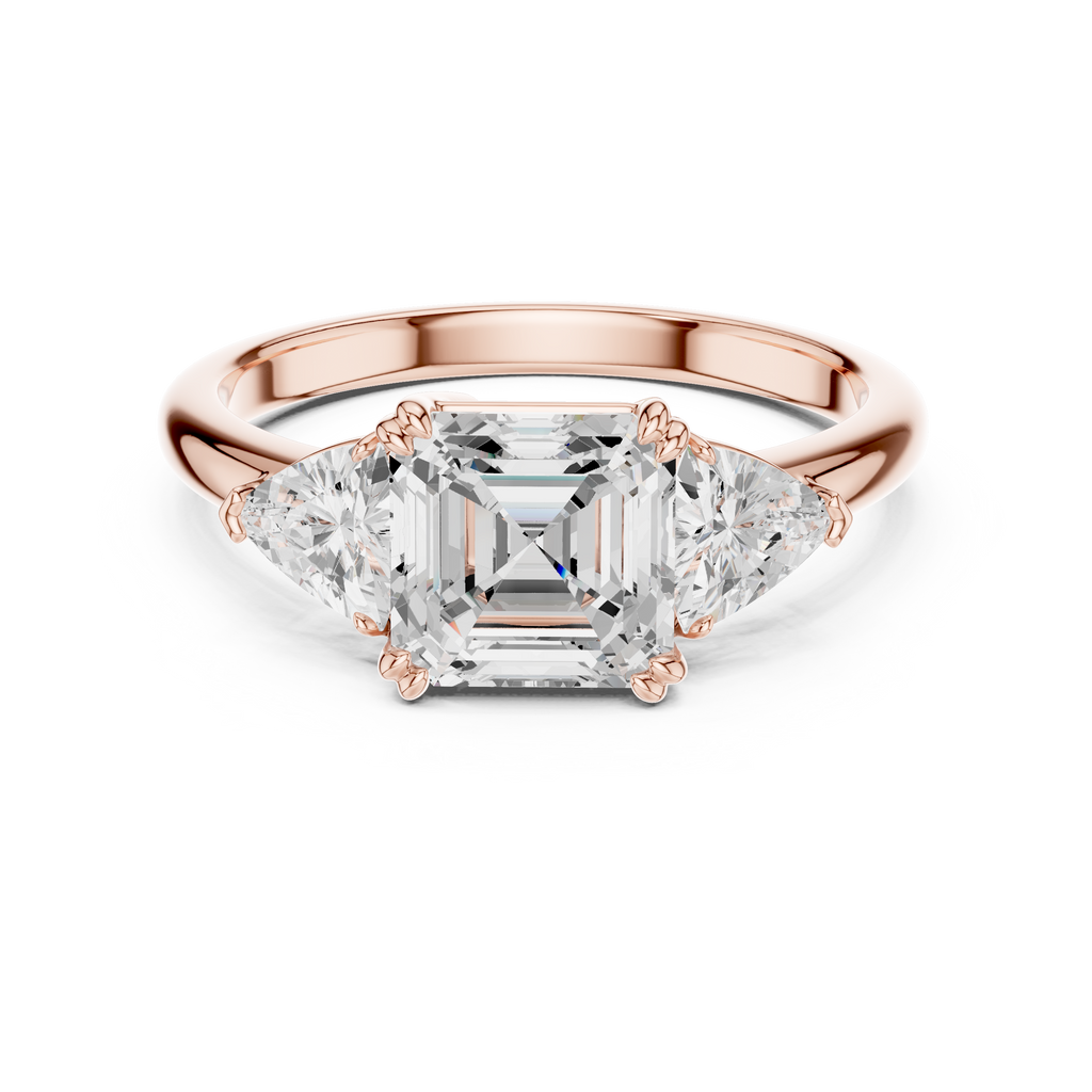 Emerald Cut Three Stone Engagement Ring with Trillion Side Diamonds
