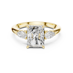 Radiant Cut Three Stone Diamond Engagement Ring with Pear Side Stones