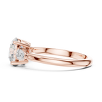 Round Cut Three Stone Diamond Engagement Ring with Pear Side Stones