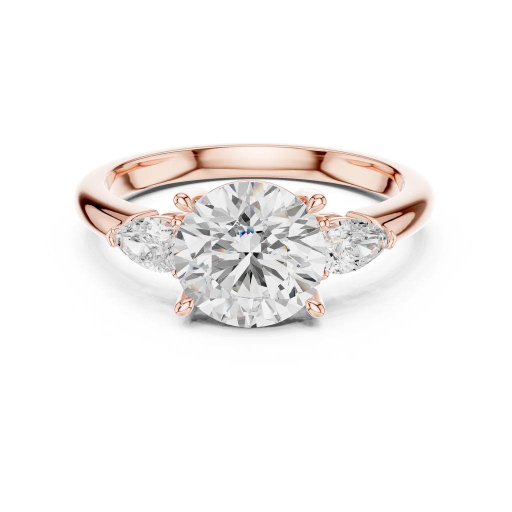 Round Cut Three Stone Diamond Engagement Ring with Pear Side Stones