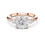 Round Cut Three Stone Diamond Engagement Ring with Pear Side Stones