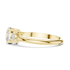 Round Three Stone Diamond Engagement Ring with Pear Side Stones