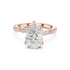 Pear Cut Diamond Twisted Pavé Engagement Ring