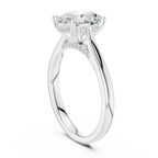 Oval Cut Hidden Halo Diamond Engagement Ring in Cathedral Setting