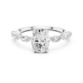 Oval Cut Diamond Ring with Marquise Side Stones