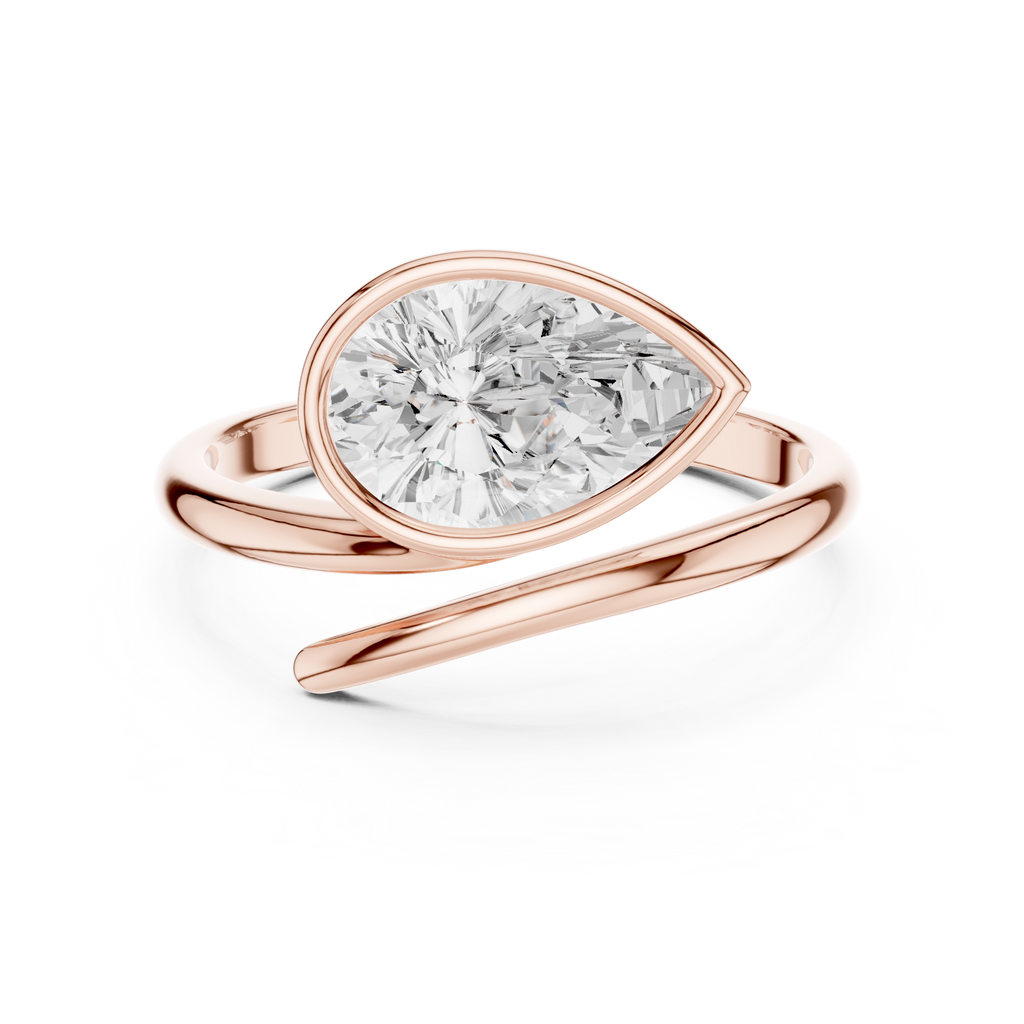 Pear Cut Bezel Set Diamond Bypass Ring