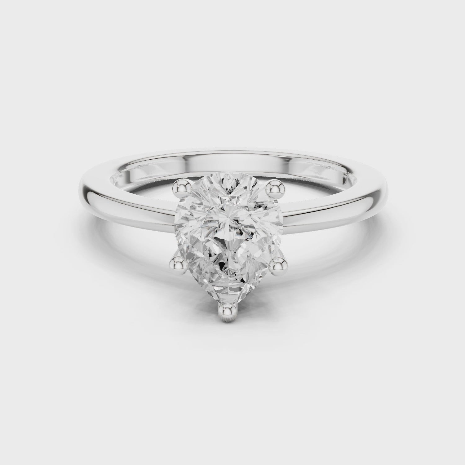 Pear Cut Solitaire Engagement Ring
