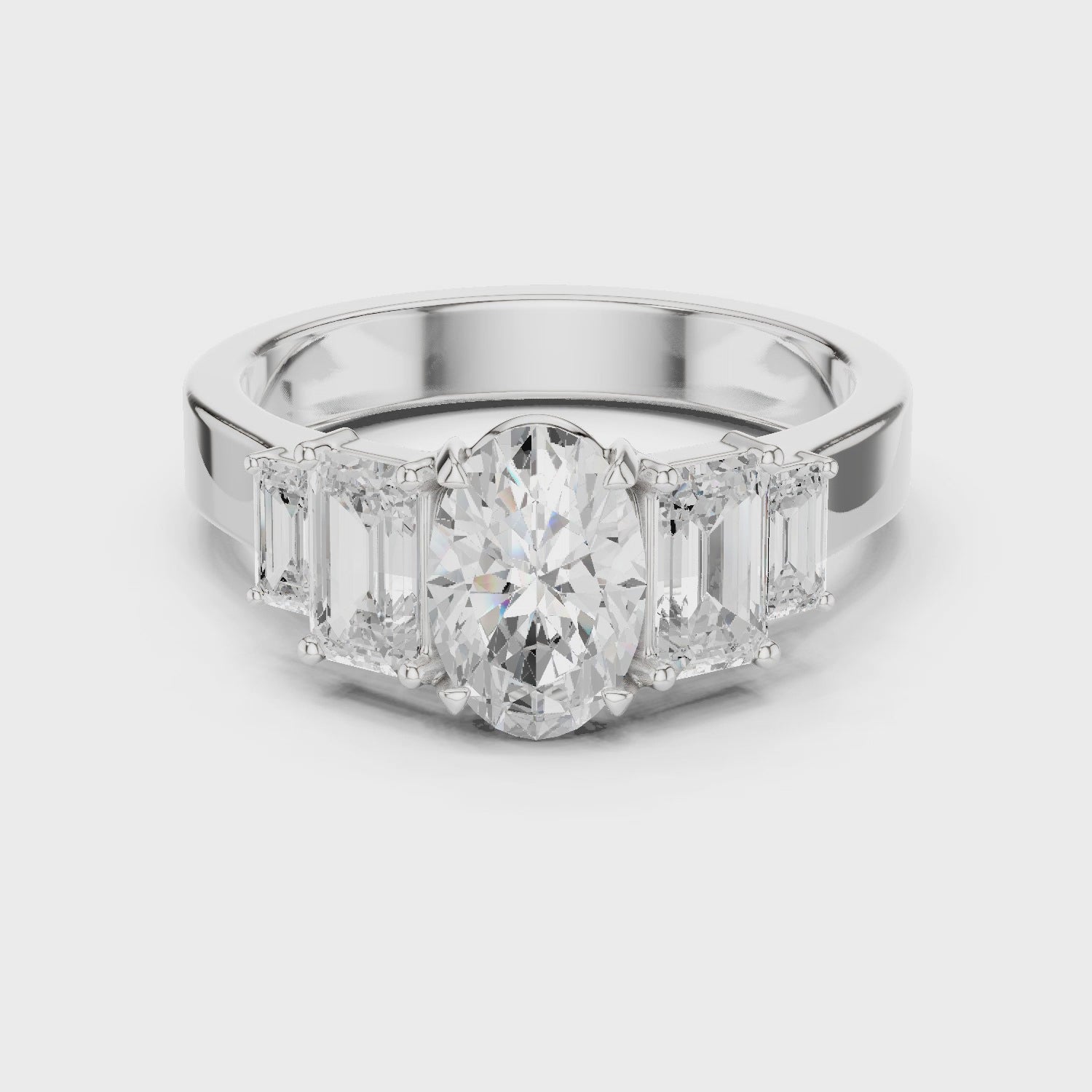 Oval & Emerald Cut Three Stone Diamond Engagement Ring