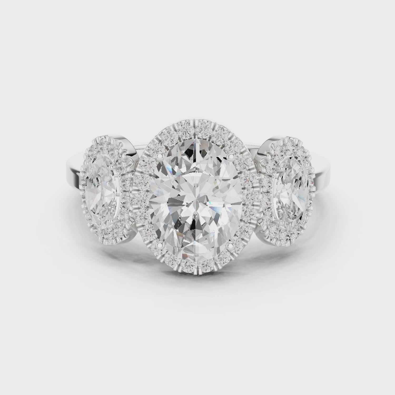 Oval Three Stone Halo Diamond Engagement Ring