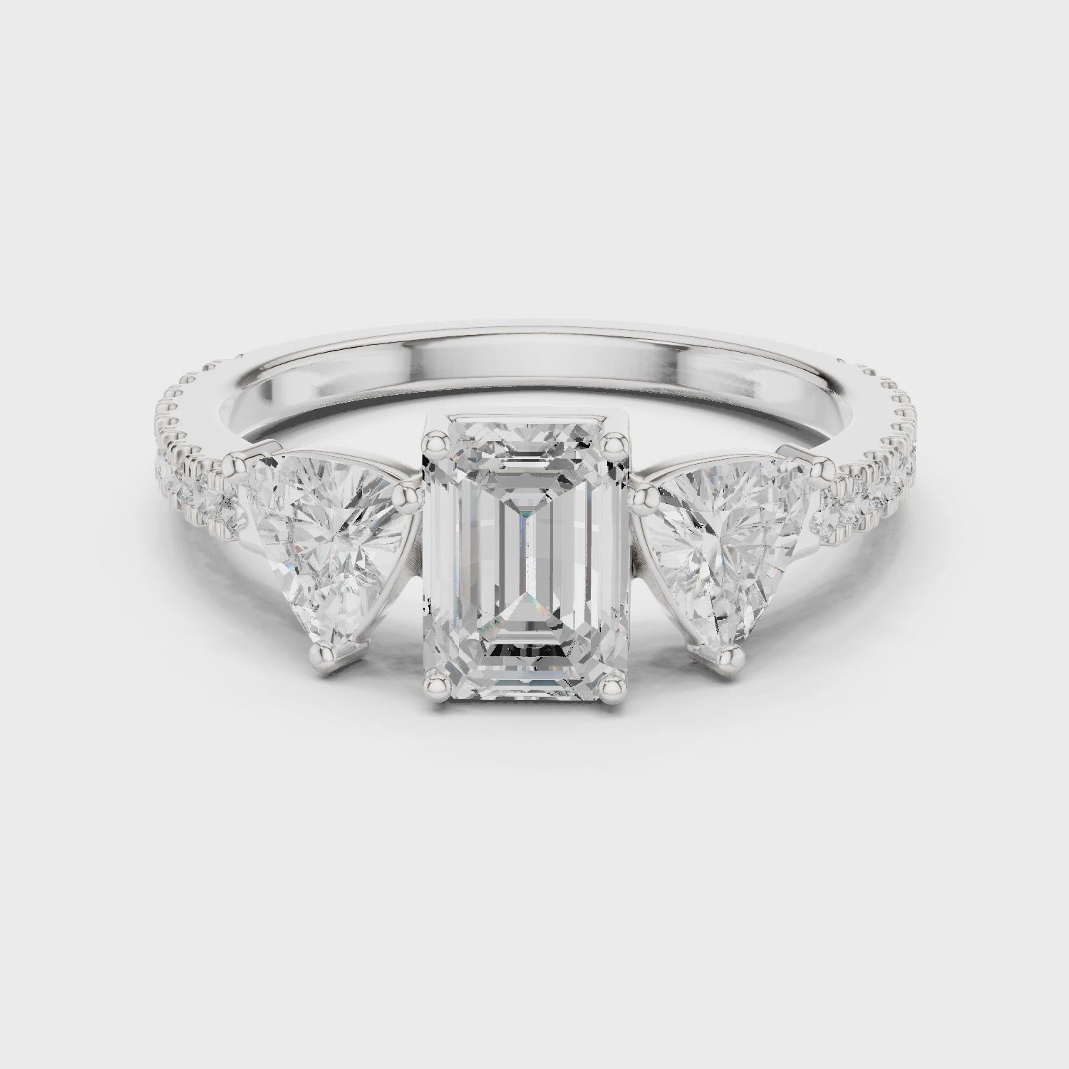 Emerald Cut Three Stone Diamond Engagement Ring with Trillion Side Stones