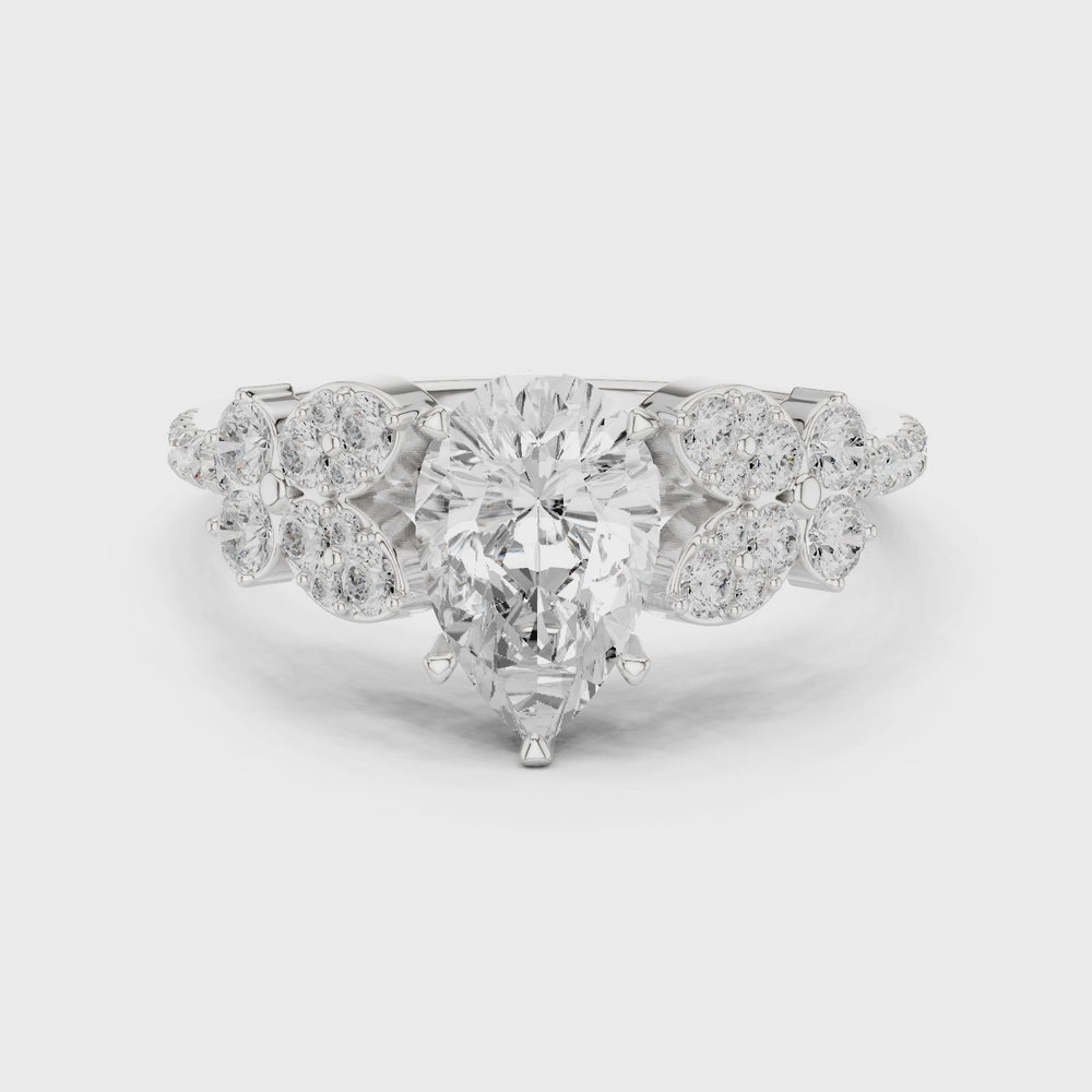 Vintage Pear Cut Diamond Engagement Ring with Side Stones