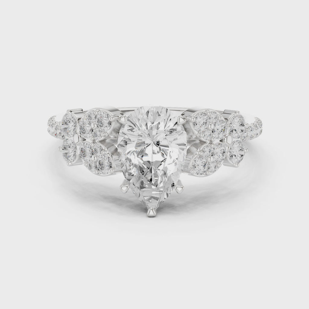 Vintage Pear Cut Diamond Engagement Ring with Side Stones