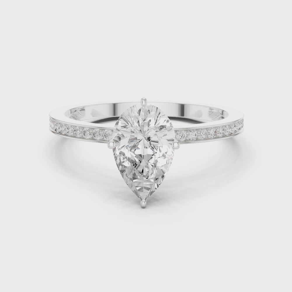 Minimal Pear Cut Pavé Diamond Engagement Ring