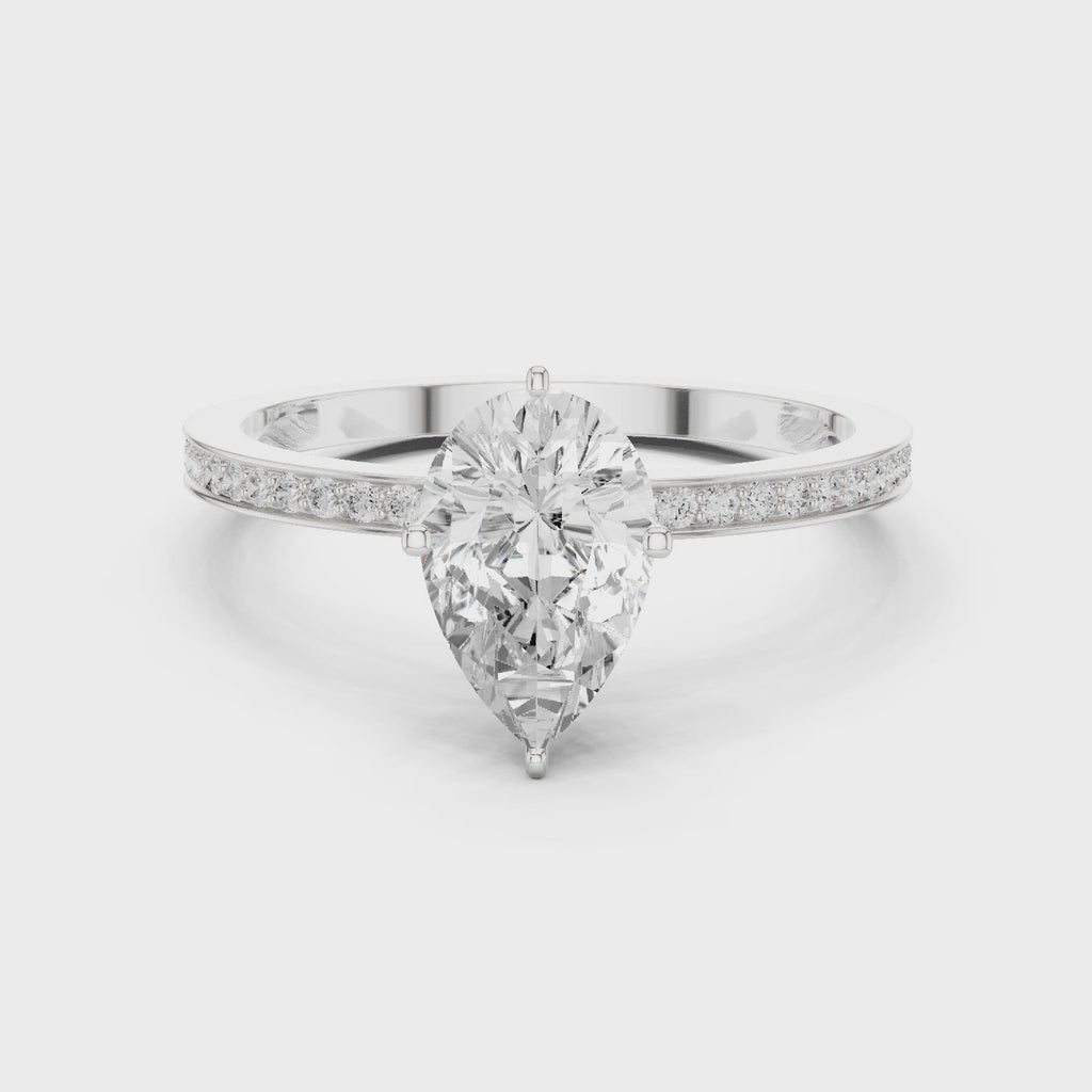 Minimal Pear Cut Pavé Diamond Engagement Ring