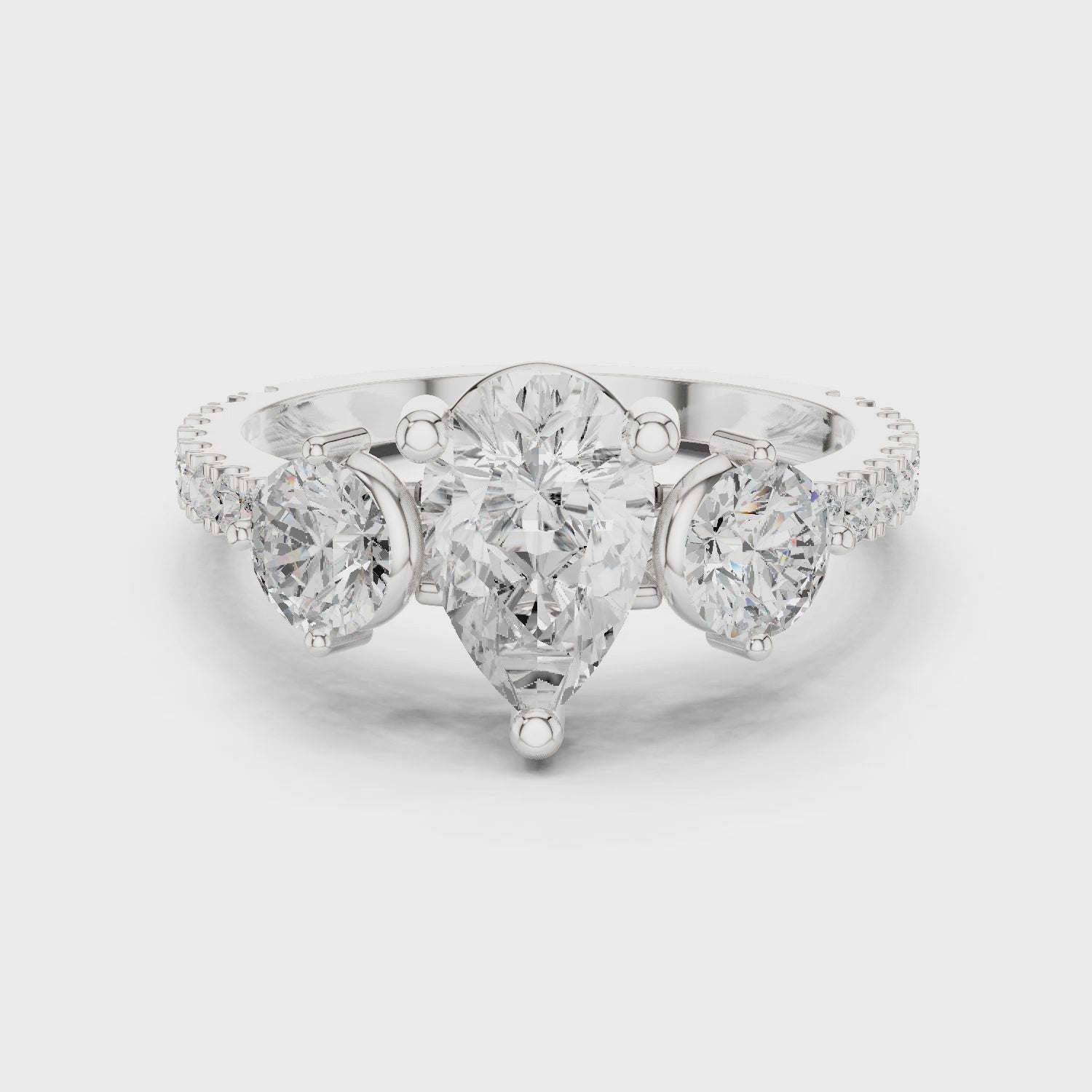 Pear Cut Three Stone Diamond Engagement Ring