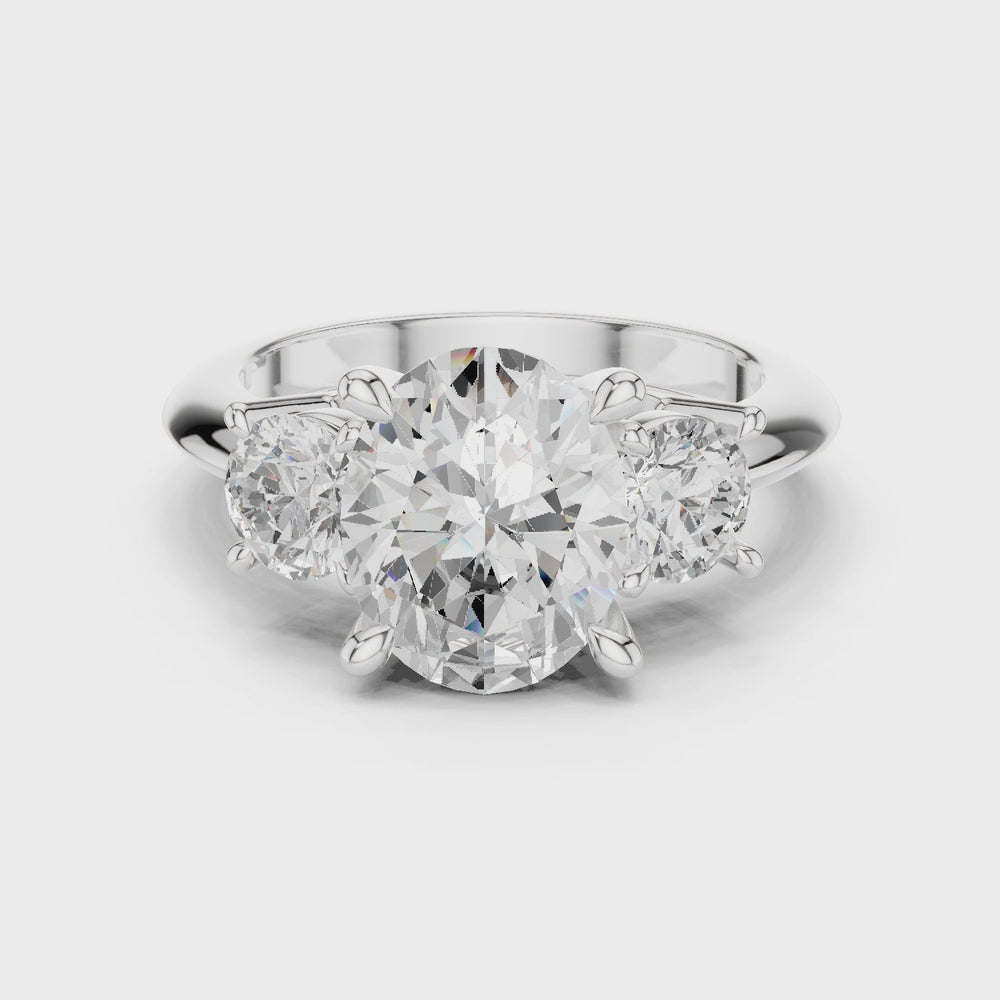 Oval Three Stone Diamond Engagement Ring with Round Side Stones