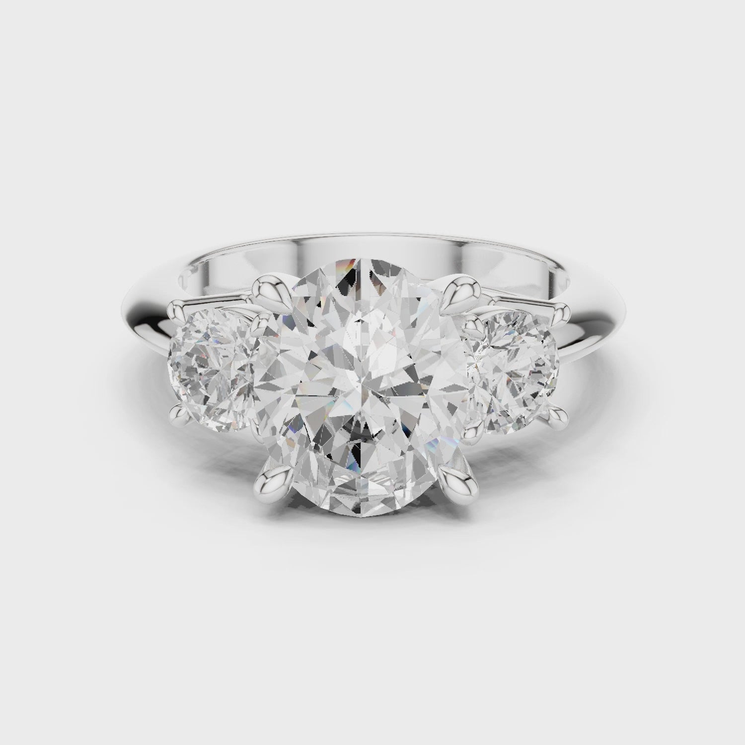 Oval Three Stone Diamond Engagement Ring with Round Side Stones