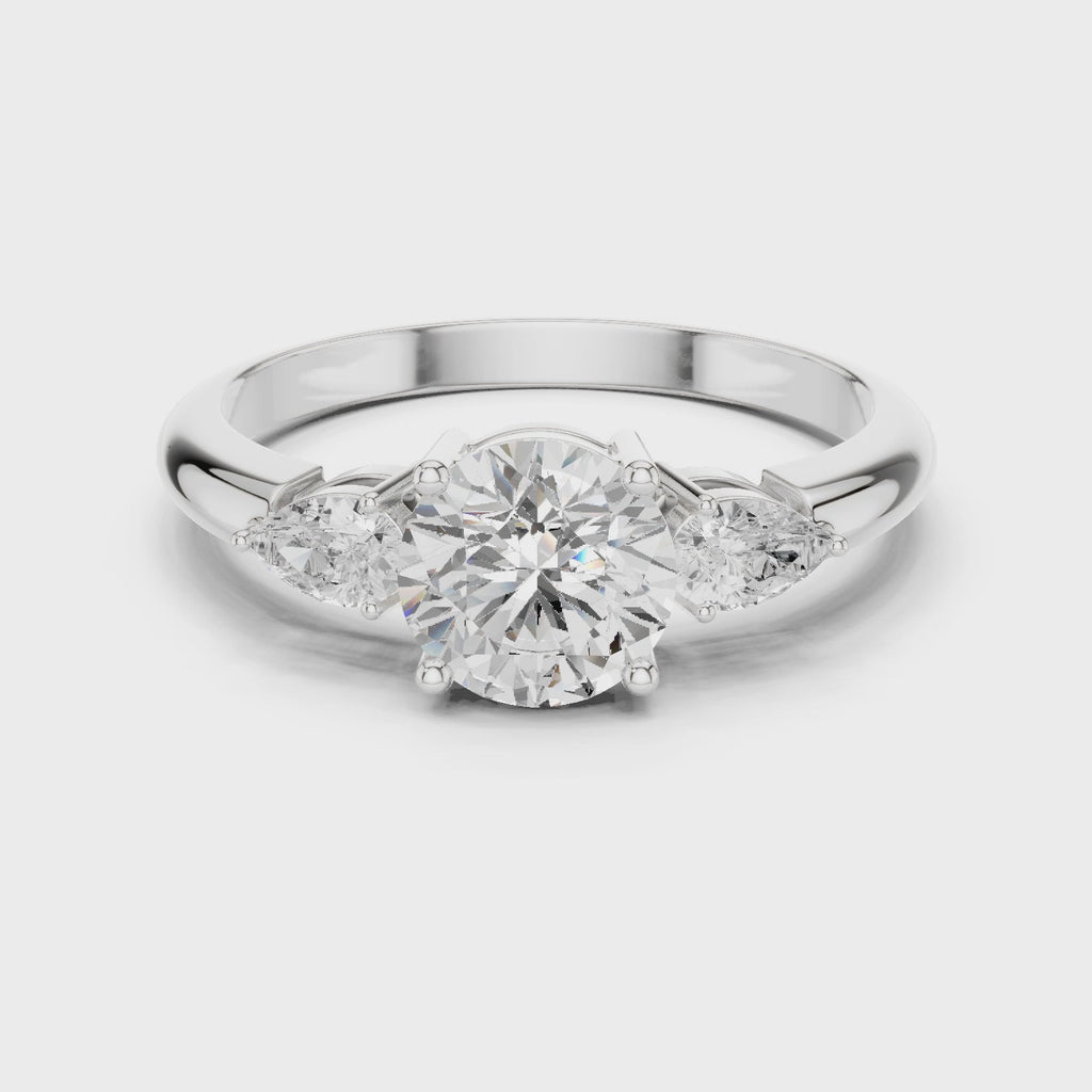 Round Three Stone Diamond Engagement Ring with Pear Side Stones