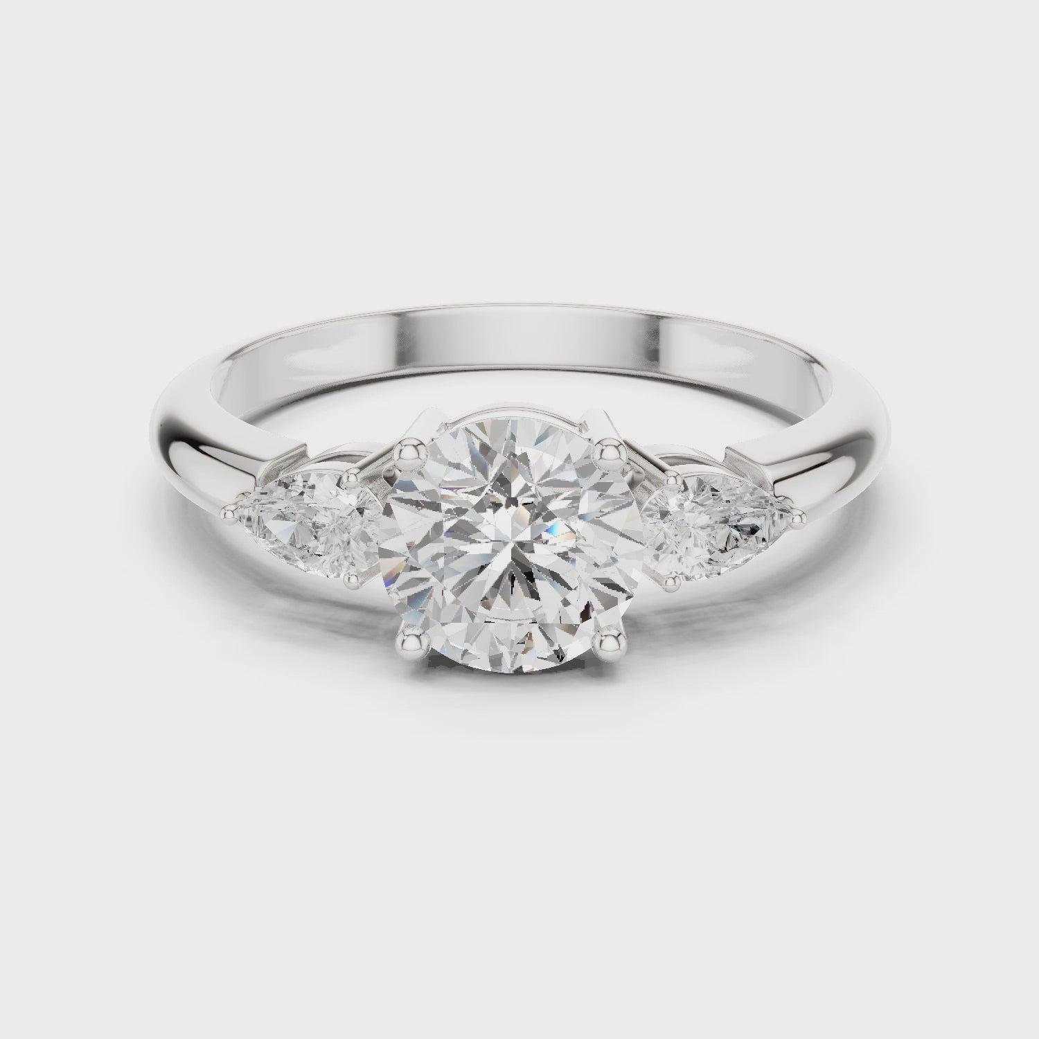 Round Three Stone Diamond Engagement Ring with Pear Side Stones