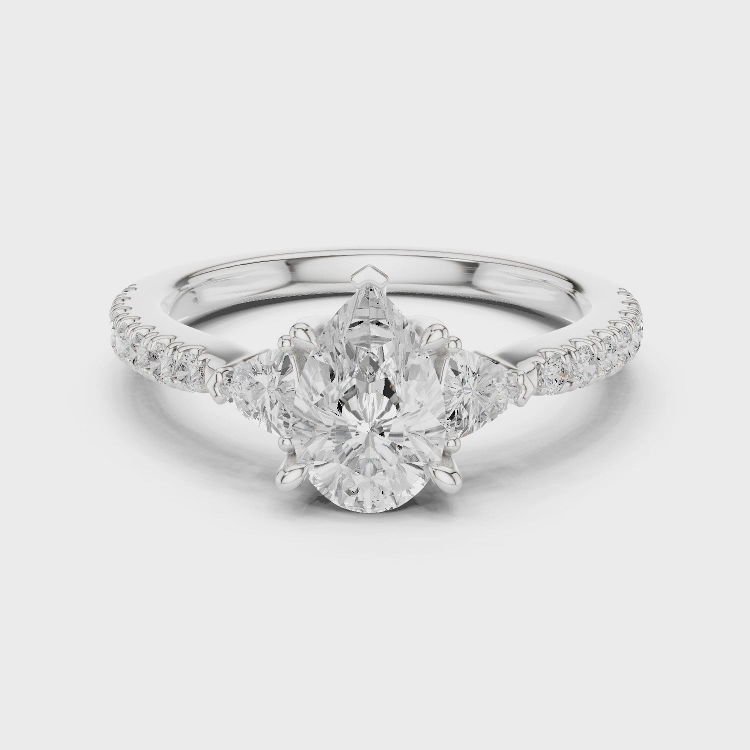 Pear Cut Three Stone Diamond Engagement Ring