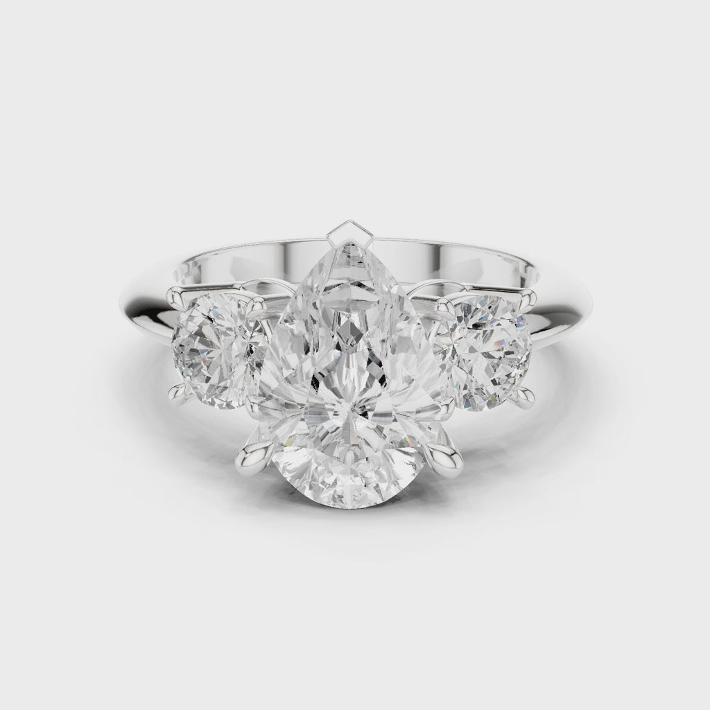 Pear Three Stone Diamond Engagement Ring with Round Side Stones