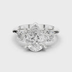 Pear Three Stone Diamond Engagement Ring with Round Side Stones