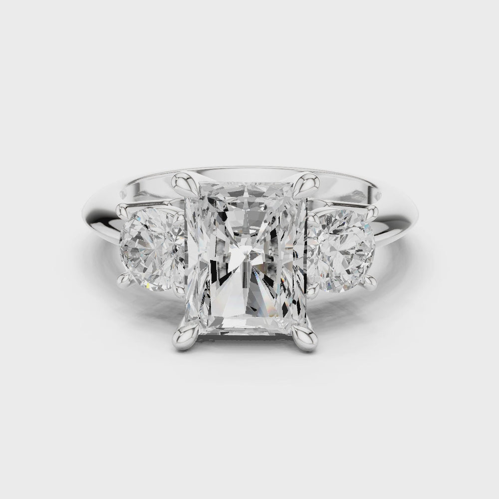 Radiant Three Stone Diamond Engagement Ring with Round Side Stones