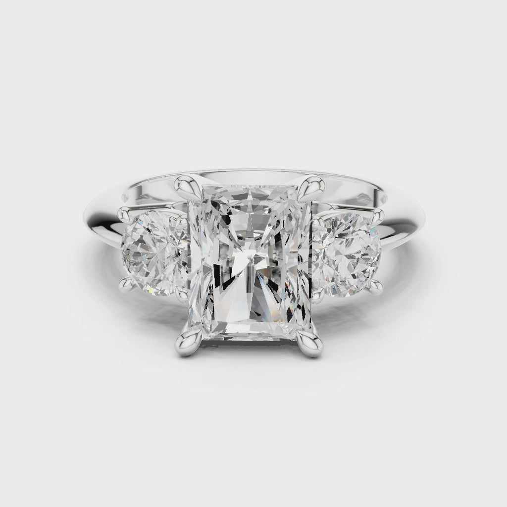 Radiant Three Stone Diamond Engagement Ring with Round Side Stones