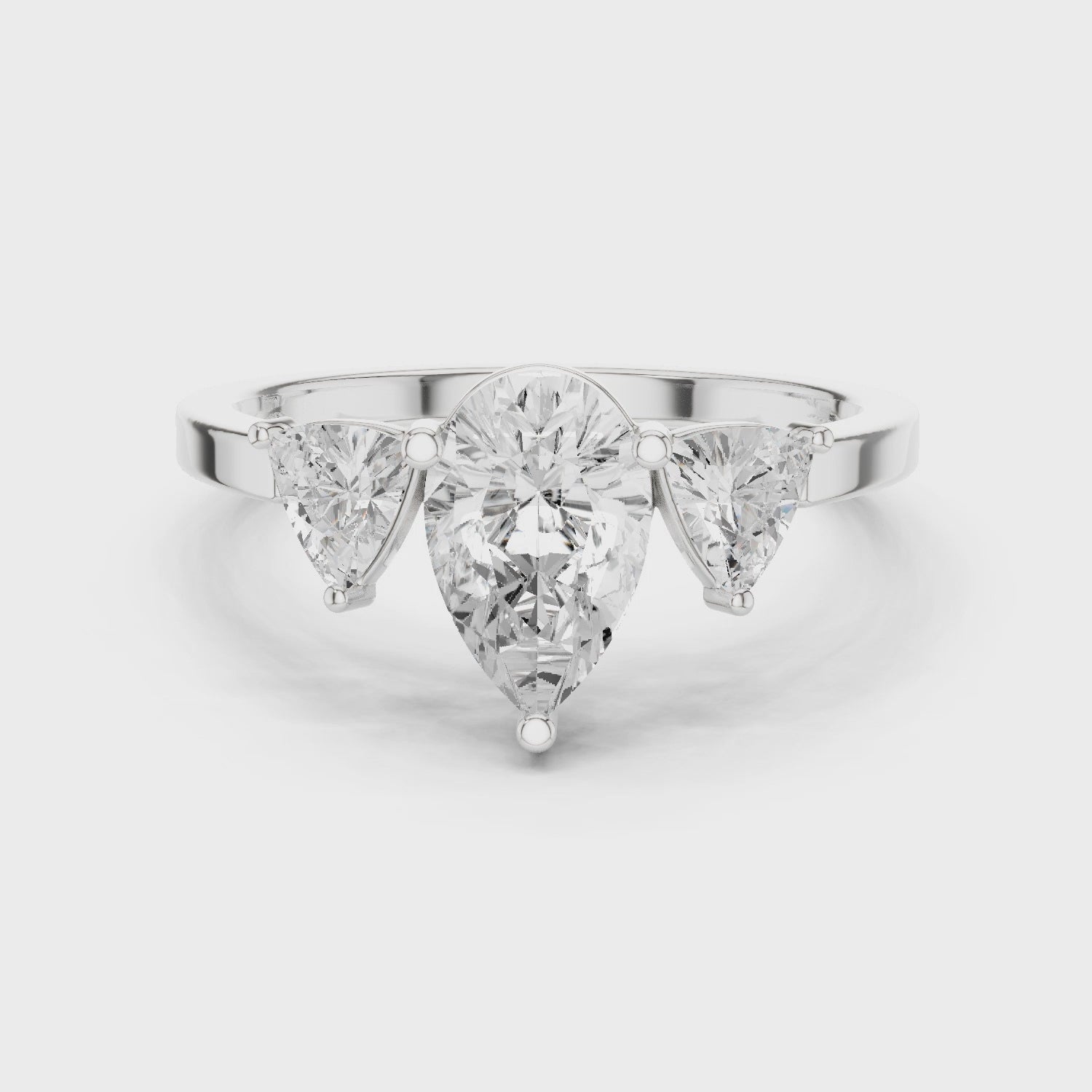 Pear Cut Three Stone Diamond Engagement Ring with Trillion Side Stones