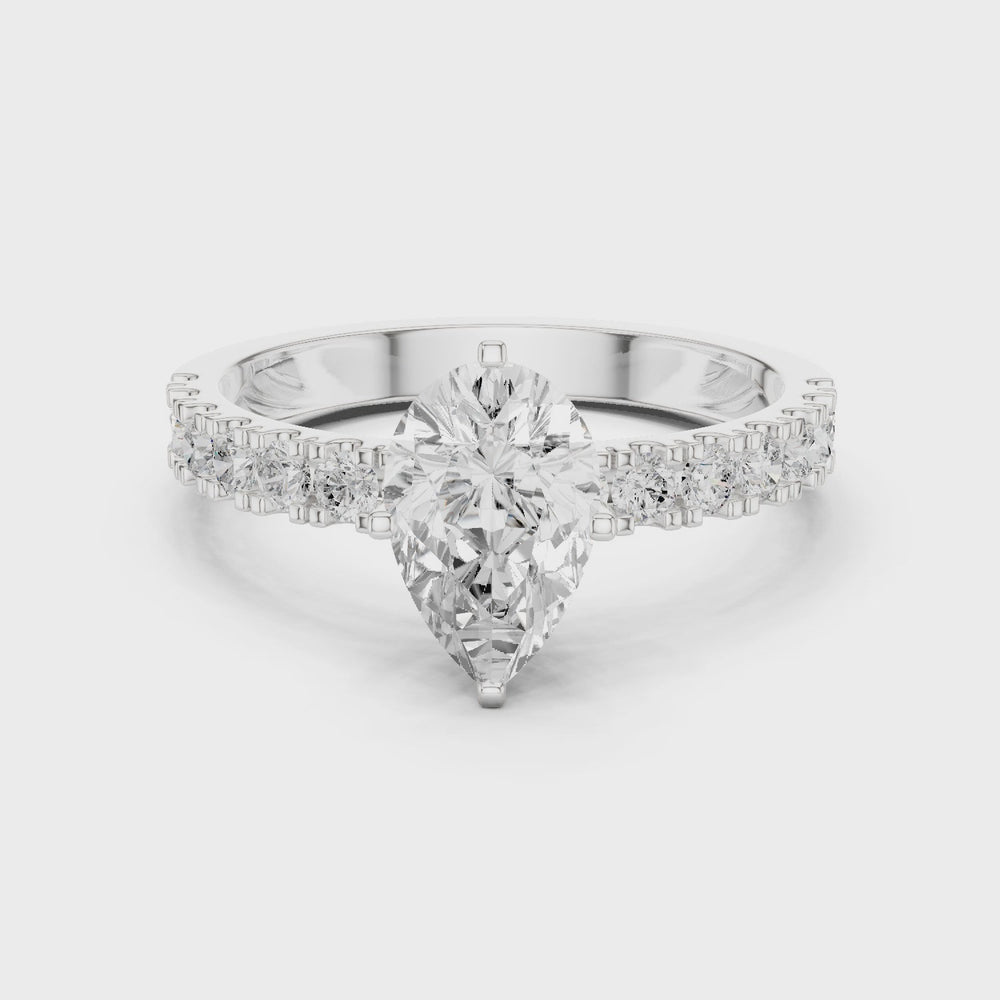 Pear Cut Diamond Solitaire Ring with Pavé Band